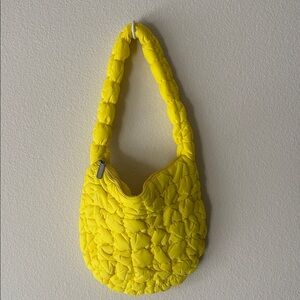neon yellow shoulder bag with puffy quilted design